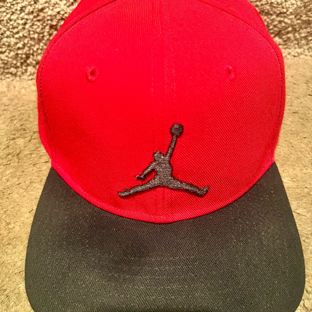 Stylish Red and Black Jordan Cap adjustable & just awesome fit. No Low Offers.